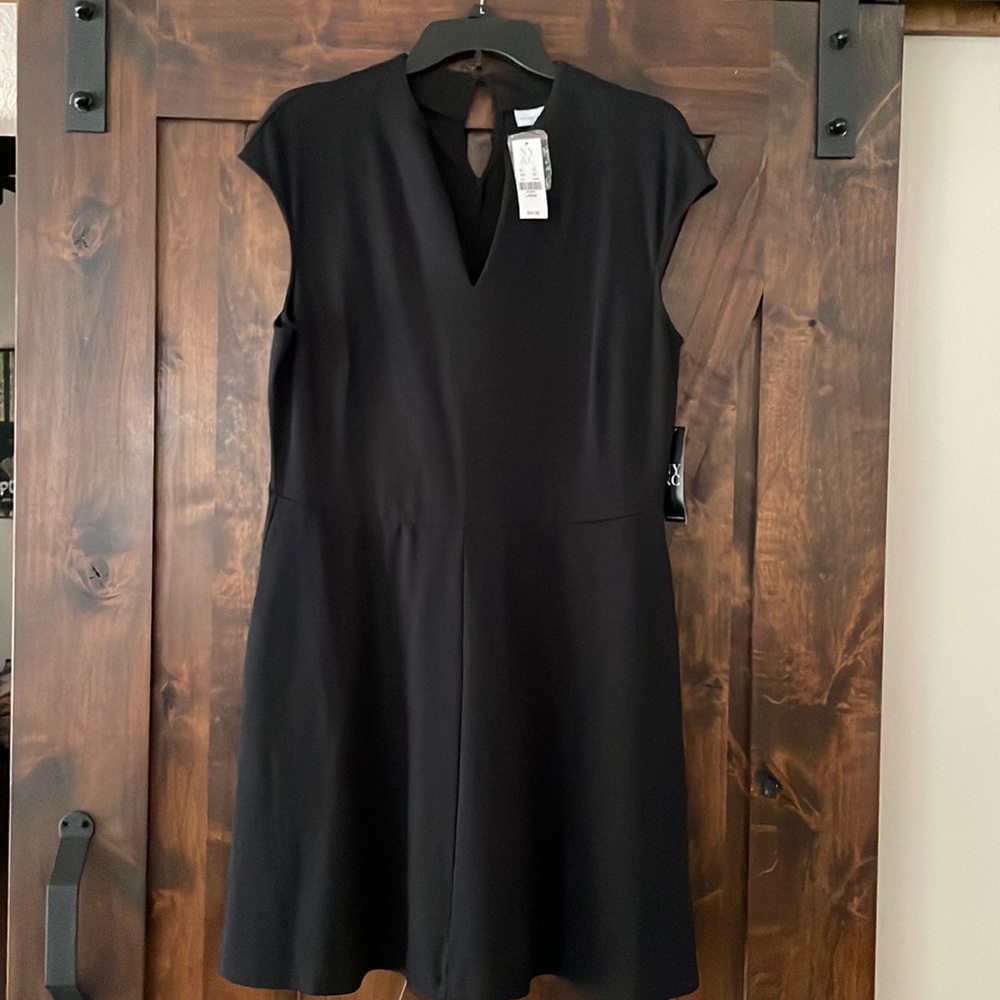Cap sleeve black dress with pockets